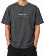 Always Late Still Ahead · 240 GSM Shadow worn front on white