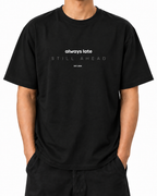 Always Late Still Ahead · 240 GSM Black worn front on white