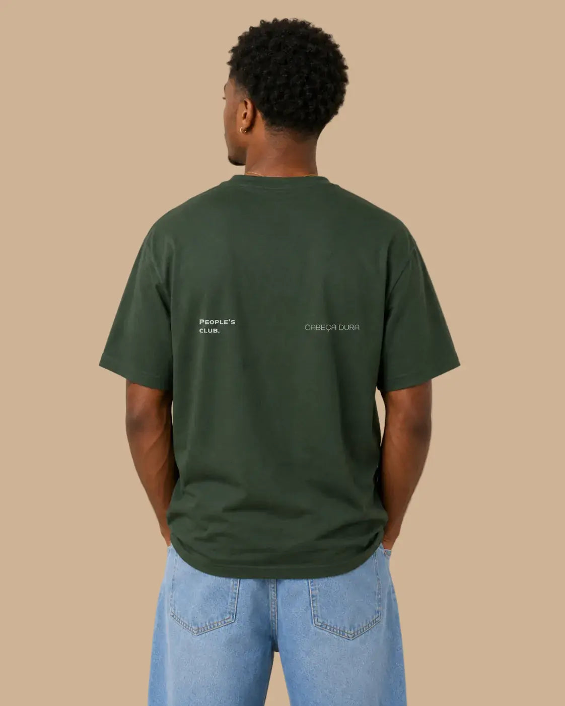 Back view of the Always Late Still Ahead forest green oversized Cabeça Dura T-shirt