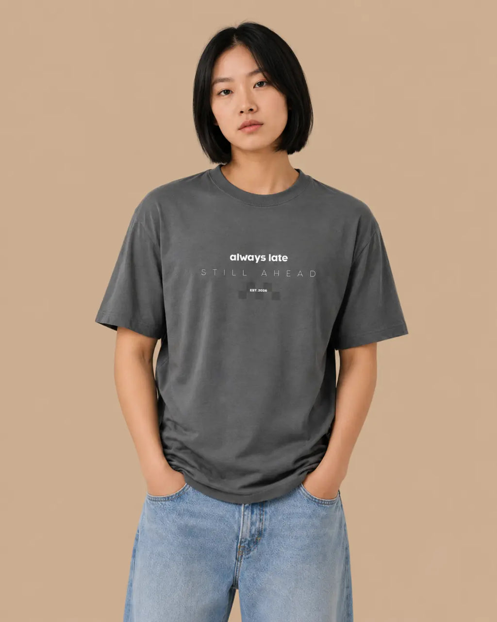 Female model wearing the Always Late Still Ahead shadow oversized T-shirt, front view