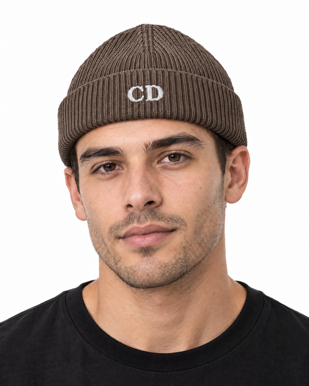 CD Fisherman Beanie — Mocha, worn front portrait on a white background with white CD embroidery.