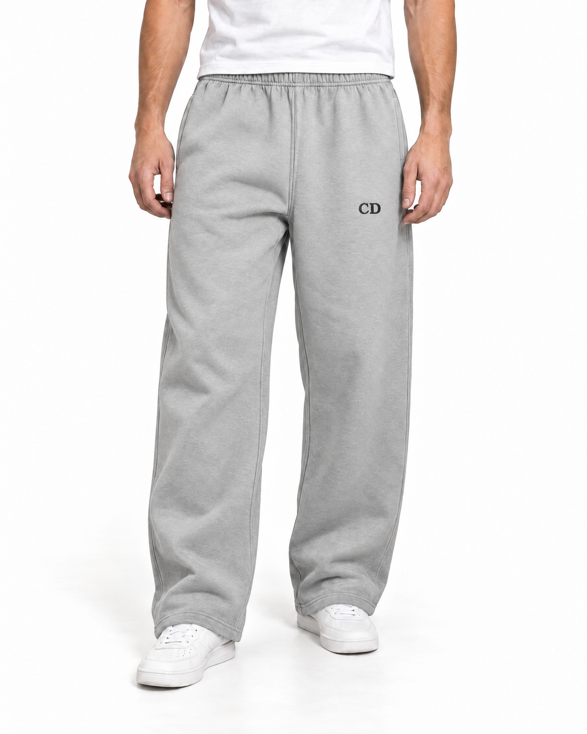 CD Heavyweight Joggers — Heather Grey, worn front view on a white background with black CD embroidery.
