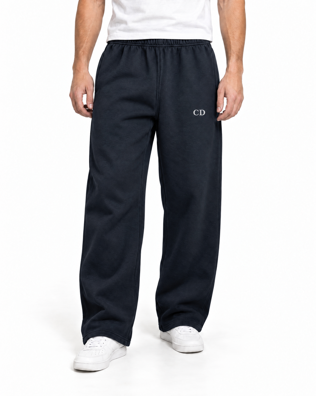 CD Heavyweight Joggers — New French Navy, worn front view on a white background with white CD embroidery.