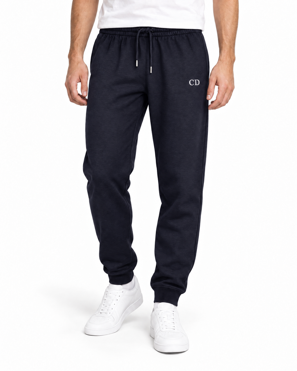 CD Mover Joggers — French Navy, worn front view on a white background with white CD embroidery.
