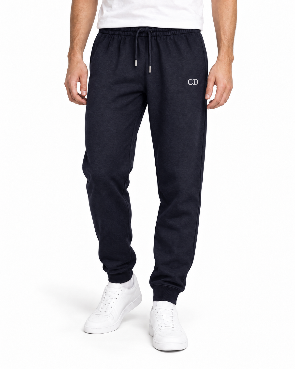 CD Mover Joggers — French Navy, worn front view on a white background with white CD embroidery.