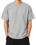 Cold Fortune T-Shirt — Heather Grey, model B wearing the T-shirt, front view on a white background.