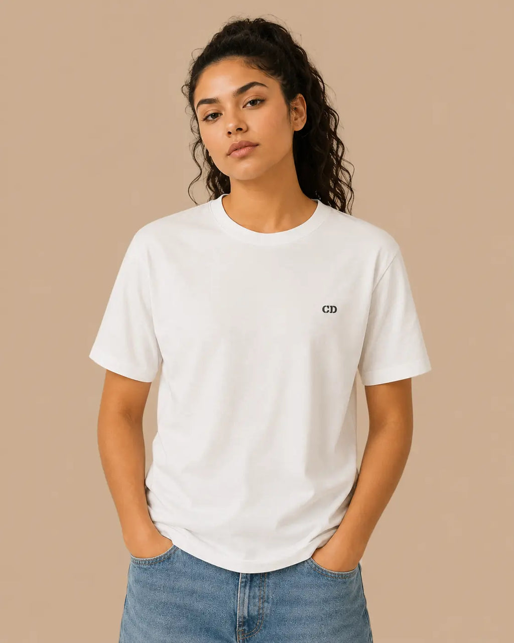 Female model wearing the white ISTINCT oversized T-shirt, front view
