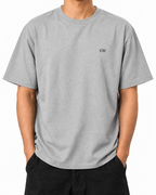 Legacy Racing Division — Heather Grey — Stella Embroidered Heather Grey worn front on white