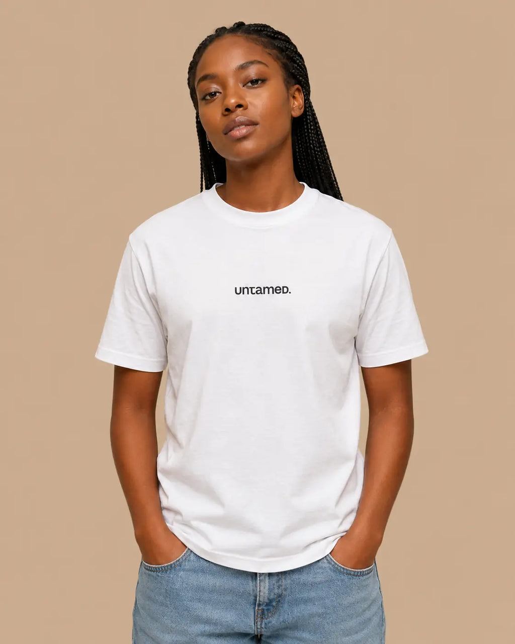 Female model wearing the People's Club white oversized T-shirt, front view