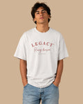Male model wearing the Legacy Racing Division white oversized T-shirt, front view