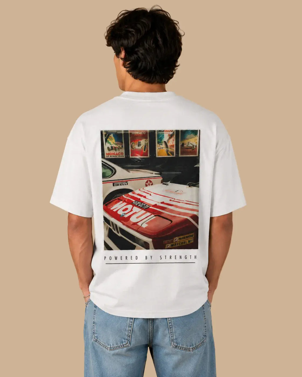 Male model wearing the Legacy Racing Division white oversized T-shirt, back view